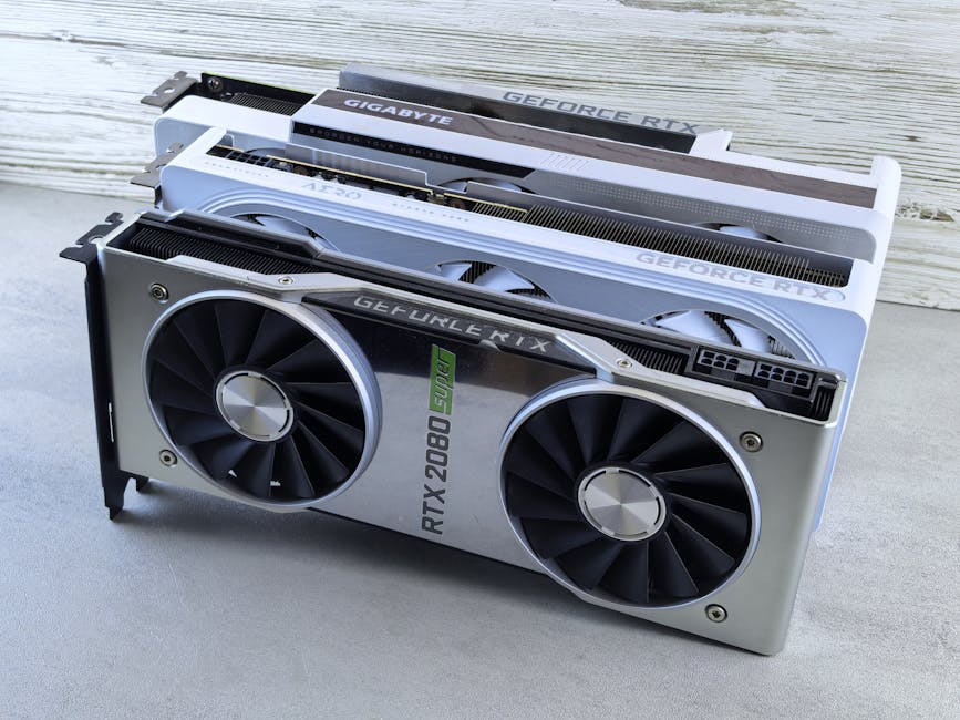 NVIDIA GeForce RTX 5080 Ti Artemis Edition Uzay Temalı Sınırlı Serisi — Three NVIDIA GeForce RTX graphics cards stacked on a surface, showcasing their s