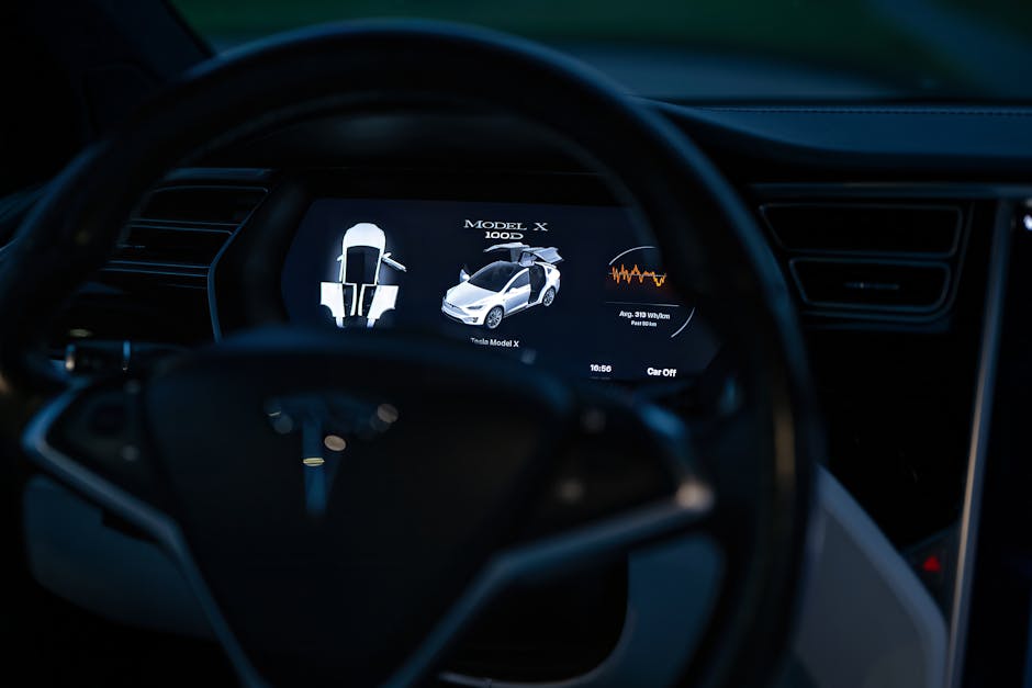 Tesla FSD Hollanda'da onaylandı: Avrupa'ya yayılım süreci başladı — Close-up of a Tesla Model X dashboard display, showcasing advanced technology fe