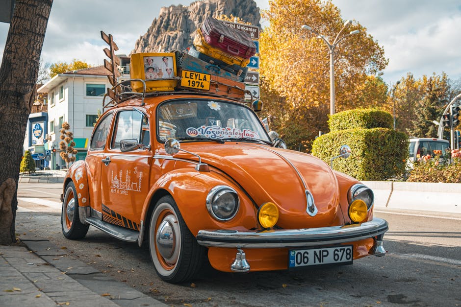 Samsung Hearapy uygulaması araç tutmasına dijital çözüm sunuyor — Orange Volkswagen Beetle parked on a vibrant street in Afyonkarahisar, Türkiye, 