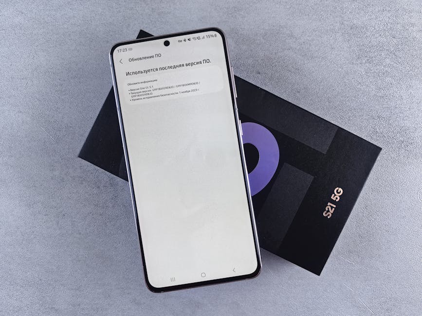 Türkiye'de 5G Hızları: İlk Testlerde 1.2 Gbps'ye Ulaştı — A smartphone on a box showing a software update screen, creating a tech-focused 