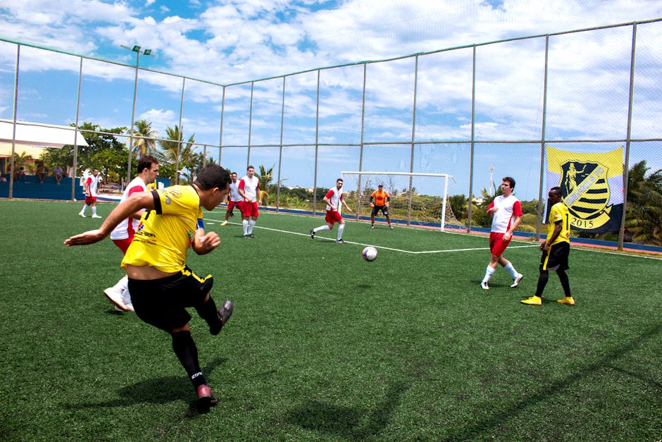 Türk Spor Dünyası Gündemde: Fenerbahçe Transfer Harekatı ve Milli Takım Başarısı — Dynamic soccer match with players in action on a bright sunny day.